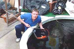 Lee catching a koi carp